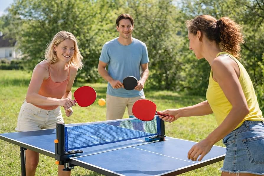 Two men playing table tennis