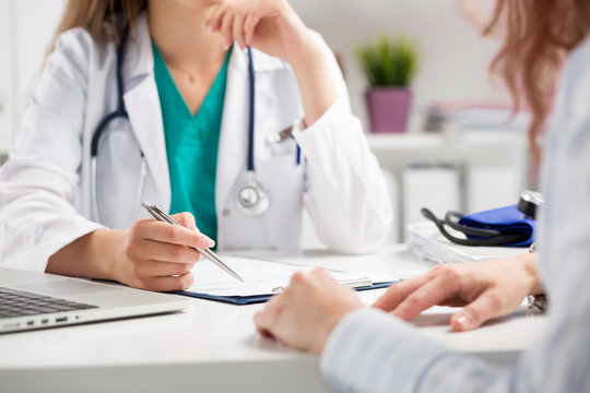 Doctor reviewing a treatment plan