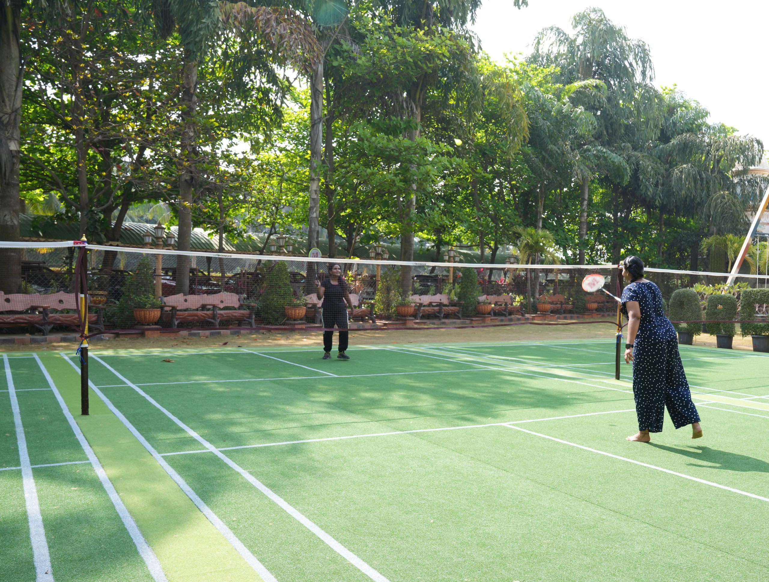 Friends playing badminton